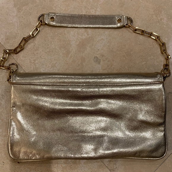 Authentic Tory Burch Reva clutch in gold - Picture 6 of 6
